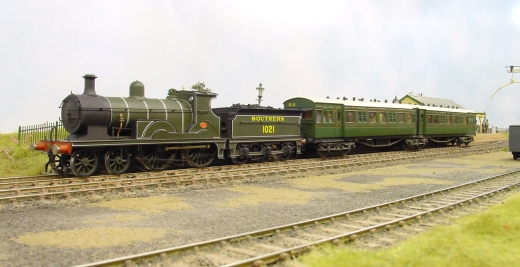 The competition winning B1 Class 4-4-0 hauling the articulated set.